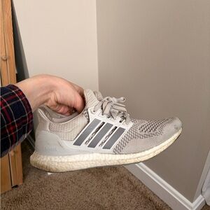 Gray and white adidas ultra boost